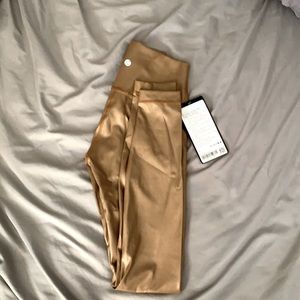 Gold Lululemon leggings. NEVER WORN